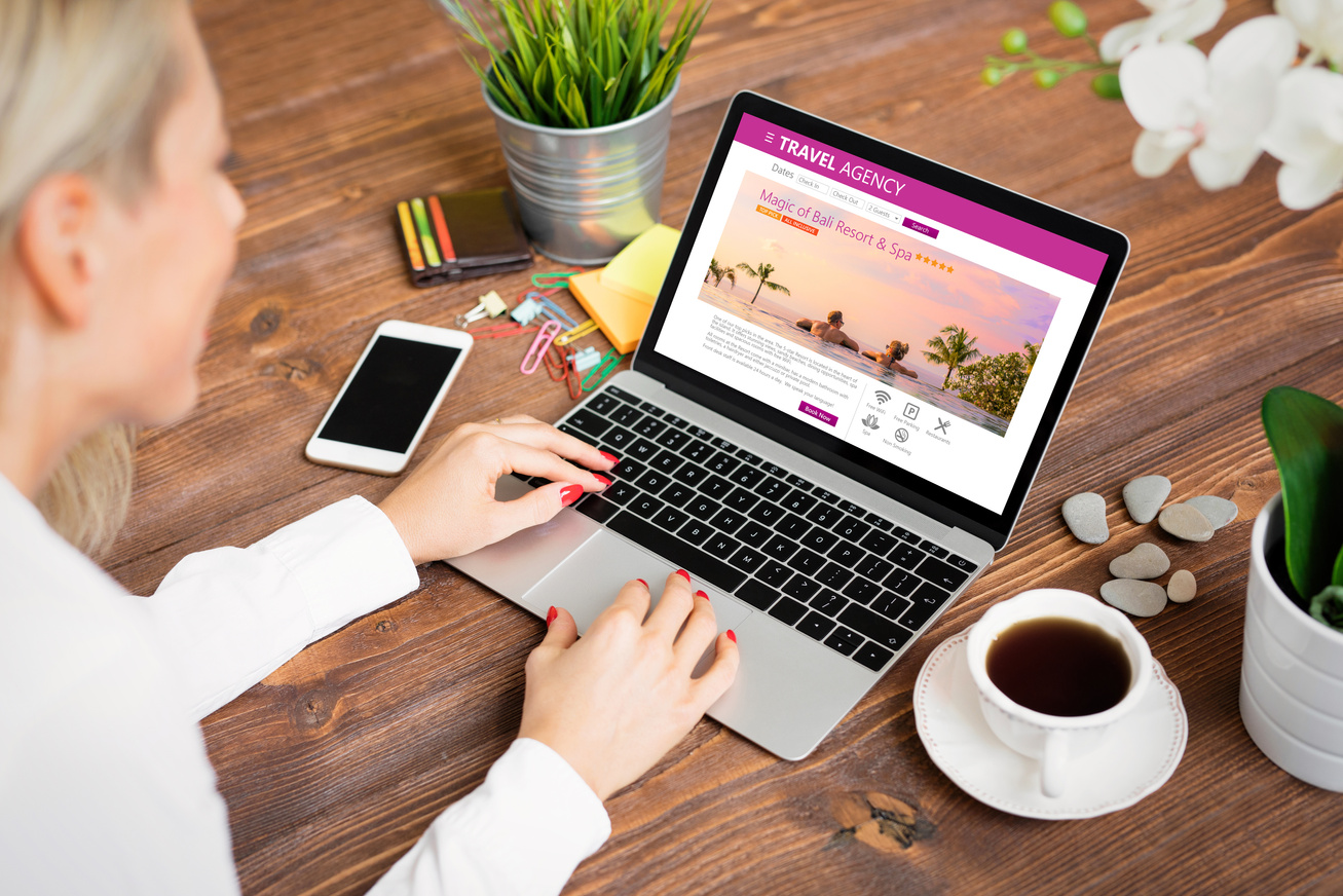 Woman Looking for Travel Accomodations